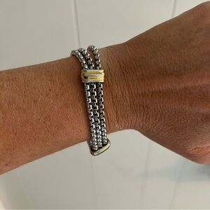 Silver bracelet with gold accents